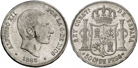 1885. Alfonso XII. Manila. 50 centavos. (Cal. 86) (Basso 66 var). 12,89 g. El 5 de la fecha rectificado sobre otro. Parte de brillo original. EBC-.