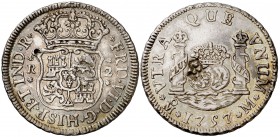 1757. Fernando VI. México. M. 2 reales. 6,84 g. Columnario. Punzonada en anverso y resello oriental grande en reverso. Gran parte del brillo original,...