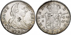 1778. Carlos III. Sevilla. CF. 4 reales. 13,51 g. Resello oriental grande en anverso y dos punzonadas en reverso. Rara. MBC.
