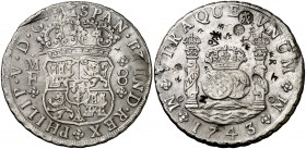 1743. Felipe V. México. MF. 8 reales. 26,70 g. Columnario. Resellos orientales. Ex Áureo 30/06/1993, nº 397. MBC+.