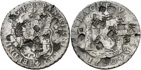 1750. Fernando VI. México. MF. 8 reales. 26,92 g. Columnario. Resellos orientales grandes. MBC.