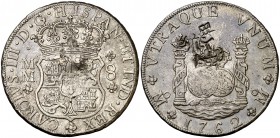 1762. Carlos III. México. MM. 8 reales. 26,93 g. Columnario. Resellos orientales. Preciosa pátina. MBC+.