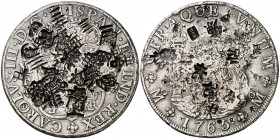 1765. Carlos III. México. MF. 8 reales. 26,88 g. Columnario. Gran cantidad de resellos orientales superpuestos, varios de los cuales se traducen en fi...