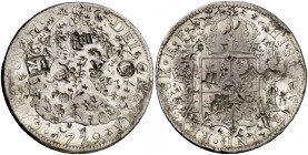 1779. Carlos III. México. FF. 8 reales. 26,53 g. Resellos orientales. MBC.