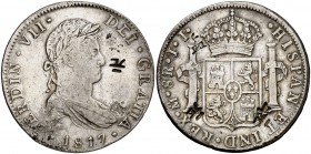 1817. Fernando VII. México. JJ. 8 reales. 26,80 g. Cuatro resellos orientales grandes. MBC+.