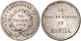 1876. Alfonso XII. La Casa de Moneda a los vencedores de Joló. (V. 847) (Basso ¿705a?). 5,38 g. Latón plateado. 23 mm. MBC+.