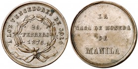 1876. Alfonso XII. La Casa de Moneda a los vencedores de Joló. (V. 847 var. por metal) (Basso 705b). 23 mm. Golpecito en canto. Bronce. 5,76 g. EBC-.