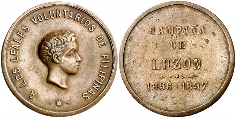 1897. Campaña de Luzón. (Pérez Guerra 773). 16,51 g. Bronce. 34 mm. Listel estre...