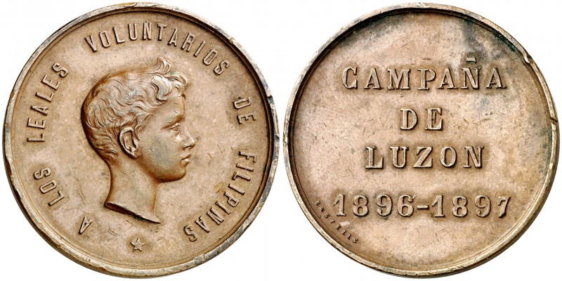 1897. Campaña de Luzón. (Pérez Guerra 773). 21,13 g. Bronce. 34 mm. Anilla elimi...