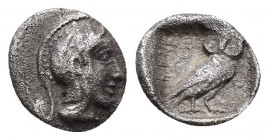 ATTICA. Athens.(Circa 500-485 BC).Obol.

Obv : Helmeted head of Athena right.

Rev : Owl standing right, head facing; olive-spray to left, all within ...