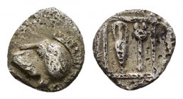 THRACO MACEDONIAN REGION.Uncertain.(4th Century BC).Hemiobol.

Obv : Crested Corinthian helmet left.

Rev : Amphora and caduceus in linear square.
Unp...