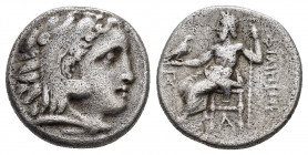 KINGS of MACEDON.Philip III.(323-317 BC).Kolophon.Drachm.

Obv : Head of Herakles right, wearing lion skin. 

Rev : ΦΙΛΙΠΠΟΥ.
Zeus seated left on thro...
