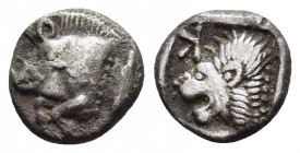 MYSIA.Kyzikos.(Circa 450-400 BC).Obol.

Obv : Forepart of boar left, tunny upward to right.

Rev : Head of roaring lion left, retrograde K to upper le...