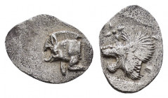 MYSIA.Kyzikos.(Circa 450-400 BC).Obol.

Obv : Forepart of boar left, tunny fish behind.

Rev : Head of roaring lion left , above star; all within squa...