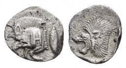 MYSIA.Kyzikos.(Circa 450-400 BC).Obol.

Obv : Forepart of boar left, tunny fish behind.

Rev : Head of roaring lion left within incuse square.H on sho...