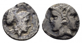 MYSIA.Lampsakos.(Circa 4th-3rd Century BC).Obol. 

Obv : Head of Athena right, wearing crested Korinthian helmet.

Rev : Janiform female head.
SNG Fra...