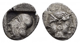 MYSIA.Lampsakos.(Circa 500-450 BC).Obol. 

Obv : Head of Athena to left, wearing Corinthian helmet, all within incuse square. 

Rev : Janiform female ...