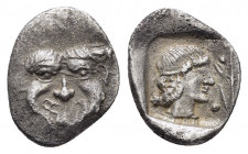 MYSIA.Gambrium.(Circa 440 BC).Obol.

Obv : Gorgoneion facing, tongue protruding. 

Rev : Youthful male head facing right, wearing taenia. In front, ol...