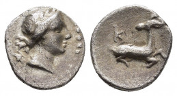 IONIA.Ephesos .(Circa 250-200 BC).Obol.

Obv : Draped bust of Artemis right, quiver at shoulder.

Rev : K.
Forepart of stag kneeling right, head left....