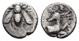IONIA.(387-295 BC).Ephesos.Obol.

Obv : E-Φ.
Bee.

Rev : E-Φ.
Right and left of forepart of stag recumbent right, head left.
Babelon Traite 1889; SNG ...