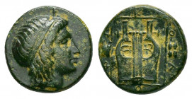 IONIA.(Circa 385-285 BC).Kolophon.Ae.

Obv : Head of Apollo right, wearing taenia.

Rev : KOΛOΦΩ.
Lyre or Kithara within linear square, Astragalos to ...