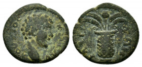 AEOLIS. Elaea.Commodus.(166-177).Ae.

Obv : KAICAP KOMOΔΟ-C.
Head of youthful to right. 

Rev : ΕΛΑΙ-ΤΩΝ.
Kalathos containing poppy and four ears of c...