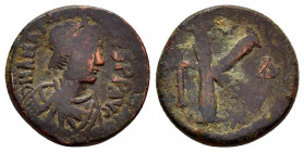 ANASTASIUS I.(491-518).Constantinople.Ae.

Obv : D N ANASTASIVS P P AVG.
Pearl-diademed, draped and cuirassed bust of Anastasius to right. 

Rev : Lar...