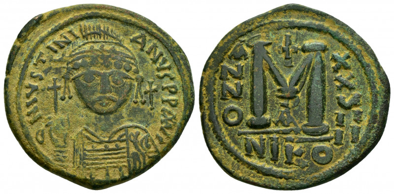 JUSTINIAN I.(527-565).Nikomedia.Ae.

Obv : D N IVSTINIANVS P P AVG.
elmeted a...