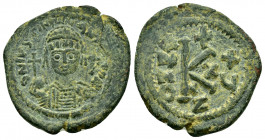 JUSTINIAN I.(527-565).Cyzicus.Half Follis.

Obv : D N IVSTINIANVS P P AVC.
Helmeted and cuirassed bust of Justinian I facing, holding globus cruciger ...