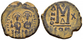 JUSTIN II with SOPHIA.(565-578).Constantinople.Ae.

Obv : D N IVSTINVS PP AVG.
Legend with Justin left holding globus cruciger and Sophia right holdin...
