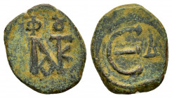 JUSTIN II.(565-578).Constantinople.Ae.

Obv : Monogram.
Rev : Large epsilon, officina letter to right.
Sear 363.

Condition : Good very fine.

Weight ...