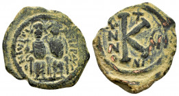 JUSTIN II and SOPHIA.(565-578).Nicomedia.Ae.

Obv : D N IVSTINVS P P.
Justin on left, Sophia on right, seated facing on double-throne, both nimbate, J...