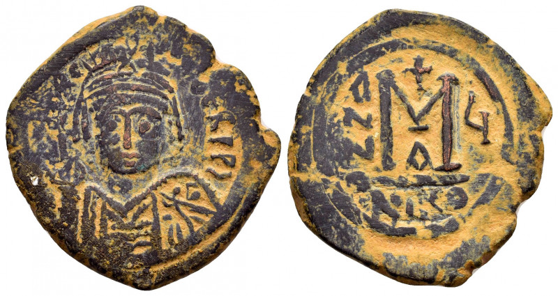 MAURICE TIBERIUS.(582-602).Nicomedia.Ae.

Obv : DN MAVRIC TIbER PP A.
Helmeted a...