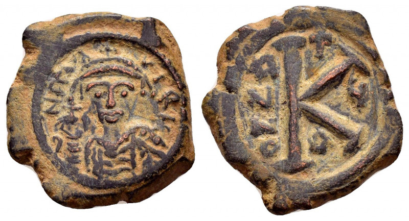 MAURICE TIBERIUS.(582-602).Constantinople.Ae.

Obv : d N mAVR CIT P P AVG.
Helme...
