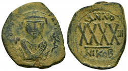 PHOCAS.(602-610).Nicomedia.Ae.

Obv : D m FOCA PER AVC.
Draped and facing bust with trefoil crown, holding mappa and cross-tipped sceptre.

Rev :...