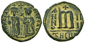PHOCAS.(602-610).Antioch.Ae.

Obv : ∂ N FOCA NЄP ЄAV.
Phocas and Leontia standing facing, holding globus cruciger and cruciform sceptre respectivel...