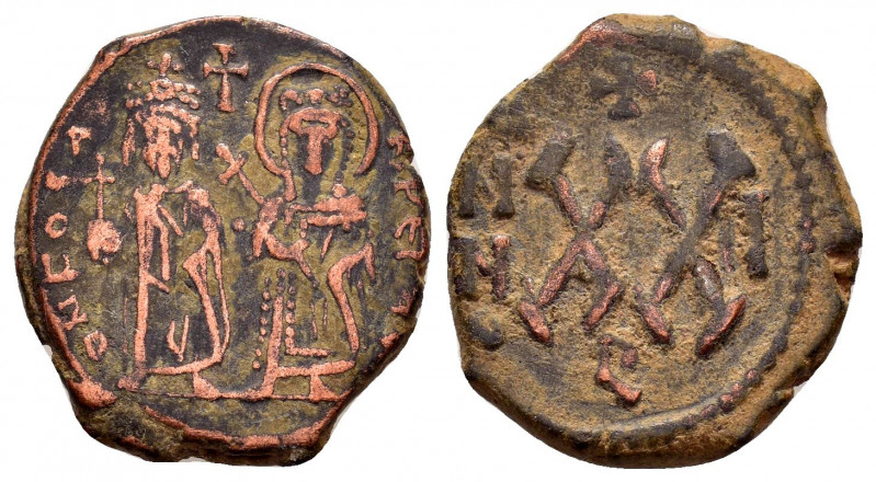 PHOCAS (602-610).Antioch.Half Follis. 

Obv : D FOCA NЄ PЄ AV.
Phocas and Leonti...