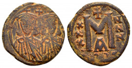 LEO III and CONSTANTINE VI.(717-741).Constantinople .Ae.

Obv : LЄON S CON.
facing busts of Leo III and Constantine V each wearing crown and chlamy...