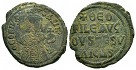 THEOPHILUS.(829-842).Constantinople.Ae.

Obv : ΘЄOFIL ЬASIL.
Facing bust, holding labarum and globus cruciger, and wearing crown surmounted by tufa.

...