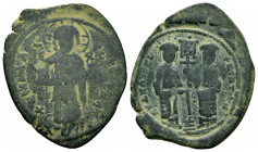 CONSTANTINE X.(1059-1067).Constantinople.Ae.

Obv : +EMMA NOVHA.
Christ standing facing on footstool, wearing nimbus and holding Gospels, IC XC across...