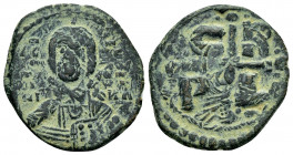 ROMANUS IV.(1068-1071).Constantinople.Ae.

Obv : IC-XC NI-KA.
Facing bust of Christ, nimbate, holding book of Gospels.

Rev : C-R P-Δ.
Cross with glob...