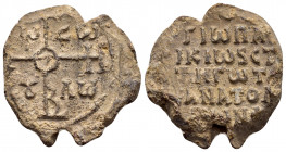 BYZANTINE LEAD SEAL.(Circa 11 th Century).Pb.

Obv : Cruciform invocative monogram. In the quarters.Indeterminate border.

Rev : Inscription of five l...