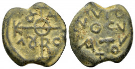 BYZANTINE LEAD SEAL.(Circa 9th/10th Century).Pb.

Obv : Cruciform invocative monogram. In the quarters.Border of dots.

Rev : Inscription of four line...