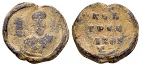 BYZANTINE LEAD SEAL.(Circa 11 th Century).Pb.

Obv : Bust of St Theodore holding a spear over his right shoulder. Border of dots.

Rev : Inscription o...