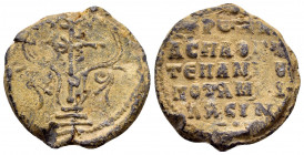BYZANTINE LEAD SEAL.(Circa 10th Century).Pb.

Obv : A patriarchal cross mounted on a base of three steps. Fleurons on either side.Border of dots.

Rev...