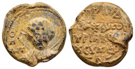 BYZANTINE LEAD SEAL.(Circa 11 th Century).Pb.

Obv : Bust of St George holding a spear over his right shoulder and a shield with his left arm.Border o...
