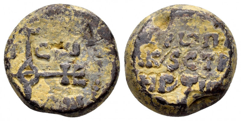 BYZANTINE SEALS.(8th Century).Pb.

Obv : Cruciform invocative monogram.

Rev : I...