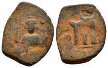UMAYYAD CALIPHATE.Pseudo Byzantine Type.Imitating the types of Constans II.(Circa 647-670).Ae.

Obv : Emperor standing facing, holding long cross and ...