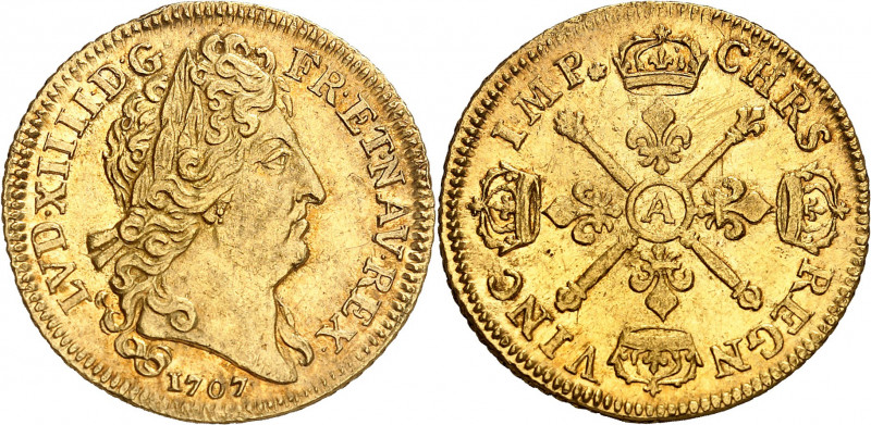 LOUIS XIV (1643-1715).
Louis d’or aux insignes 6,76 g. 1707 A=Paris
A/ LVD XII...