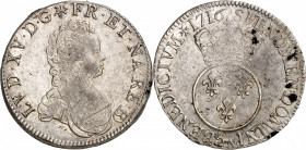 LOUIS XV (1715-1774).
Écu vertugadin 1716. 30,53 g. Vaquette= Pau 30,53 g.
A/ LVD XV D G (Différent) FR ET NA RE BD (Différent et date). Buste enfan...